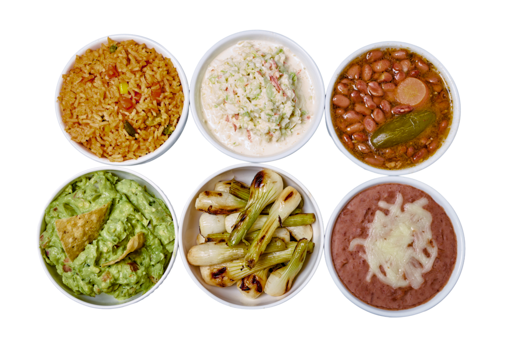 Rice, coleslaw, beans, guacamole, onions, and refried beans